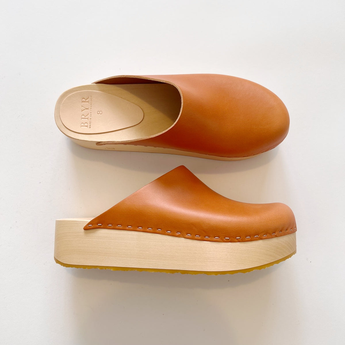 A product with a whiskey color, highlighting its elegant design and refined texture