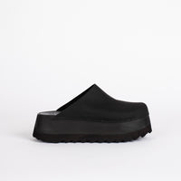 Sleek black platform clogs by Bryr Studio showcasing modern minimalist design