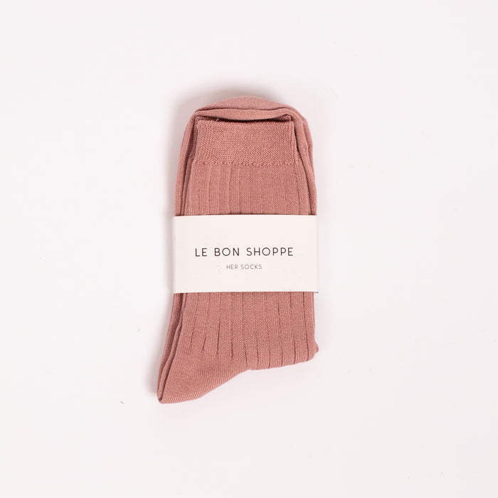 Her Socks in Desert Rose
